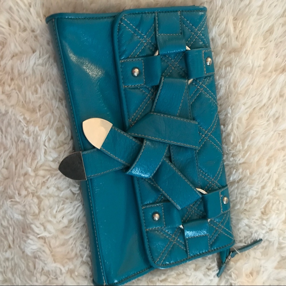 Gorgeous turquoise leather clutch.