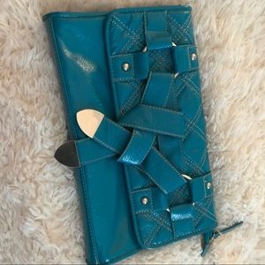 Gorgeous turquoise leather clutch.