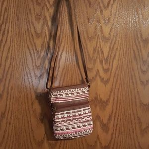 Claire's purse with elephants and teepees