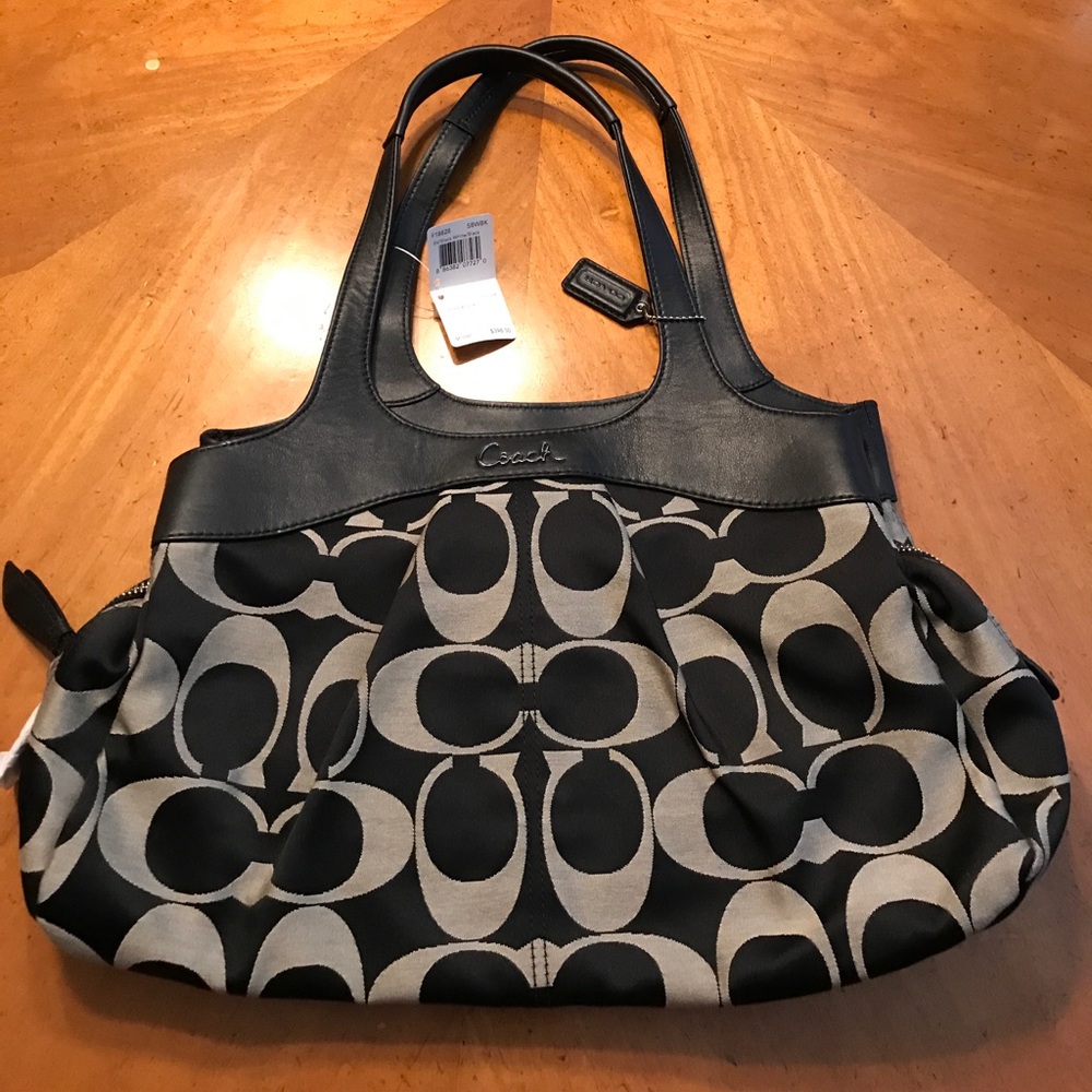 Brand new black with blue detail Coach purse