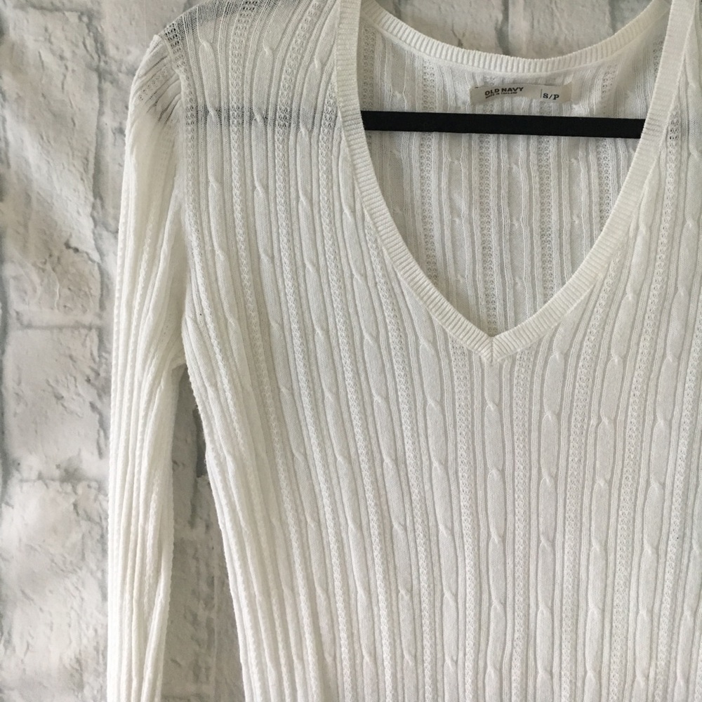 White cable knit sweater