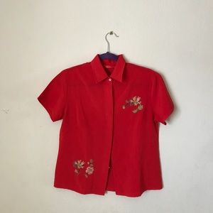 Red button up with flower stitching detail