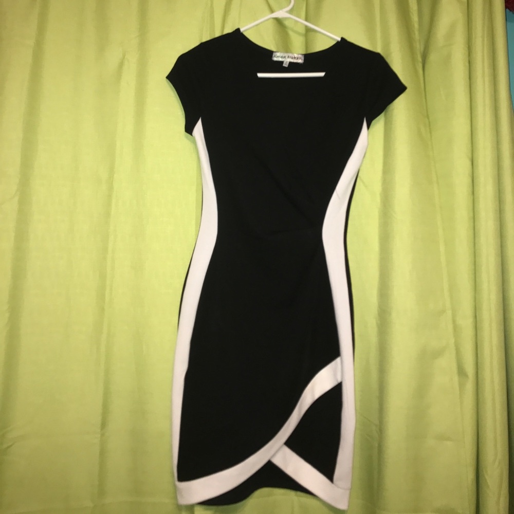 Figure fitting black and white dress