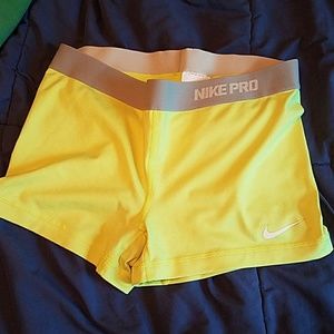 Neon yellow women's nike DRI-FIT spandex shorts