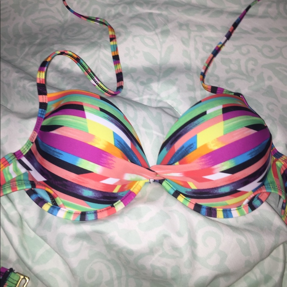 Multicolored bathing suit top, size adult small.