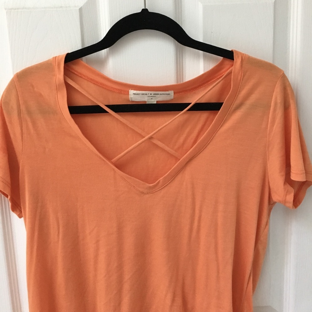 Crossfront coral tee.