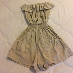 Tan romper with frill and pockets
