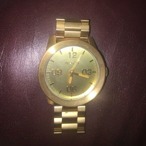 Gold Nixon watch