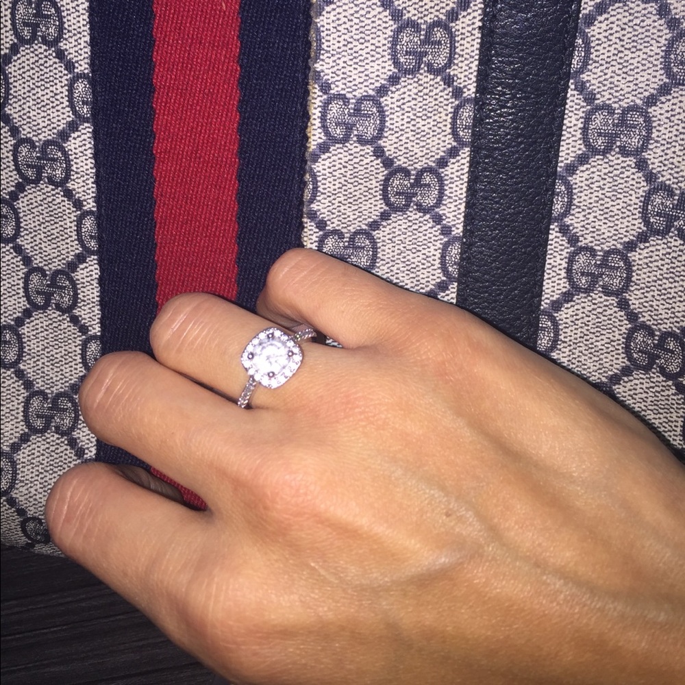 SOLD.  CZ round-cut "diamond"'ring w/ single halo