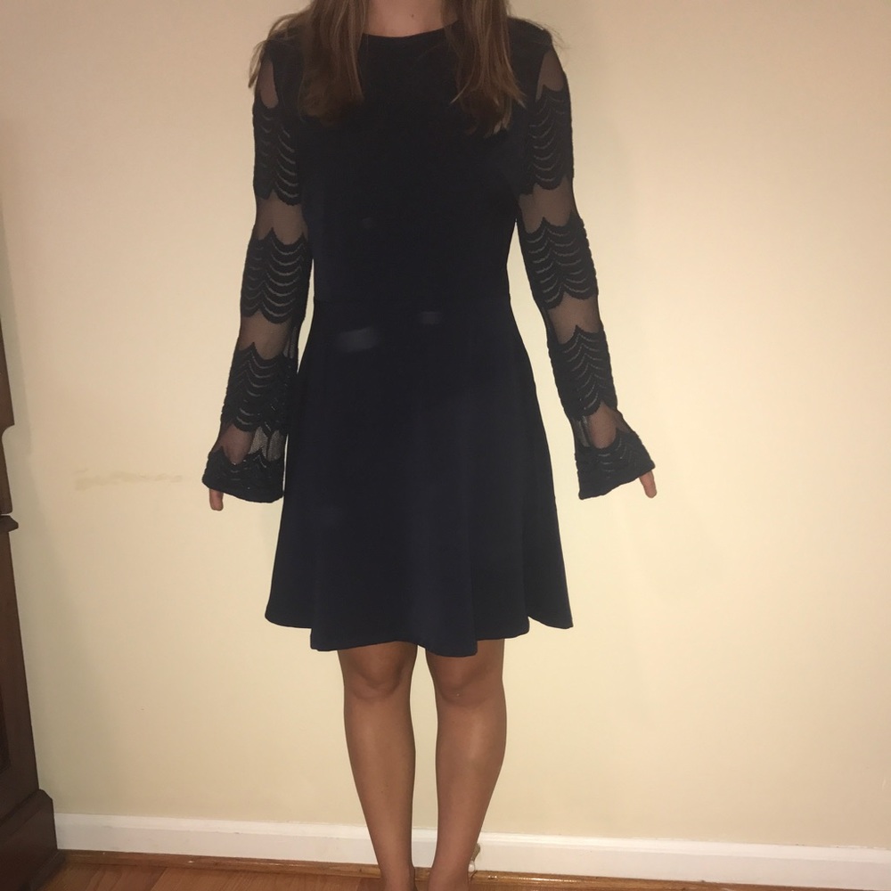 navy cocktail/game day dress with detailed back