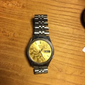 Sieko Silver Watch Gold Face