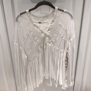 NEW WITH TAGS AND NEVER WORN white flowy shirt