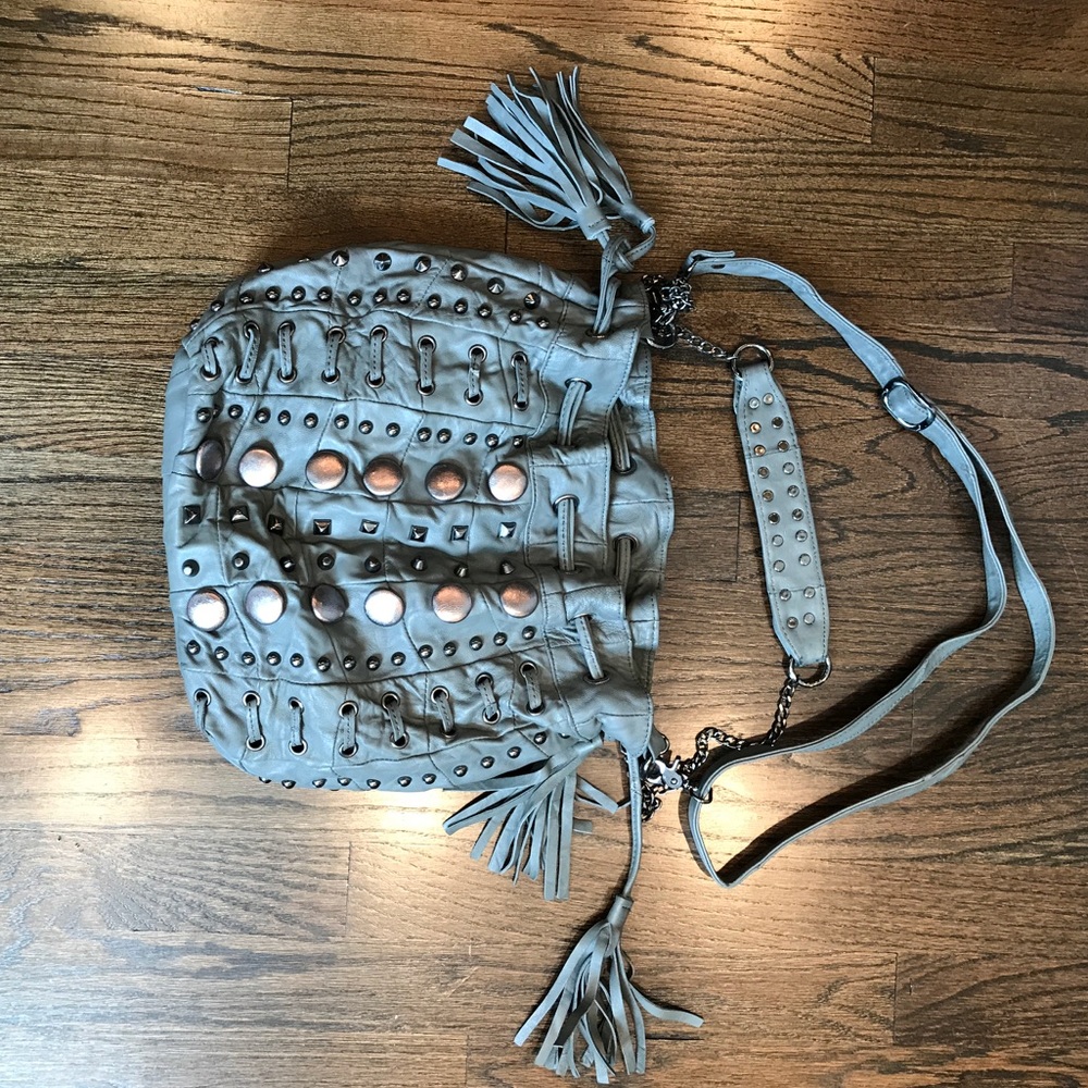 Grey leather bag with buttons, studs & lacing