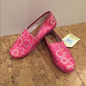 Toms Pink sparkle shoes with circle design