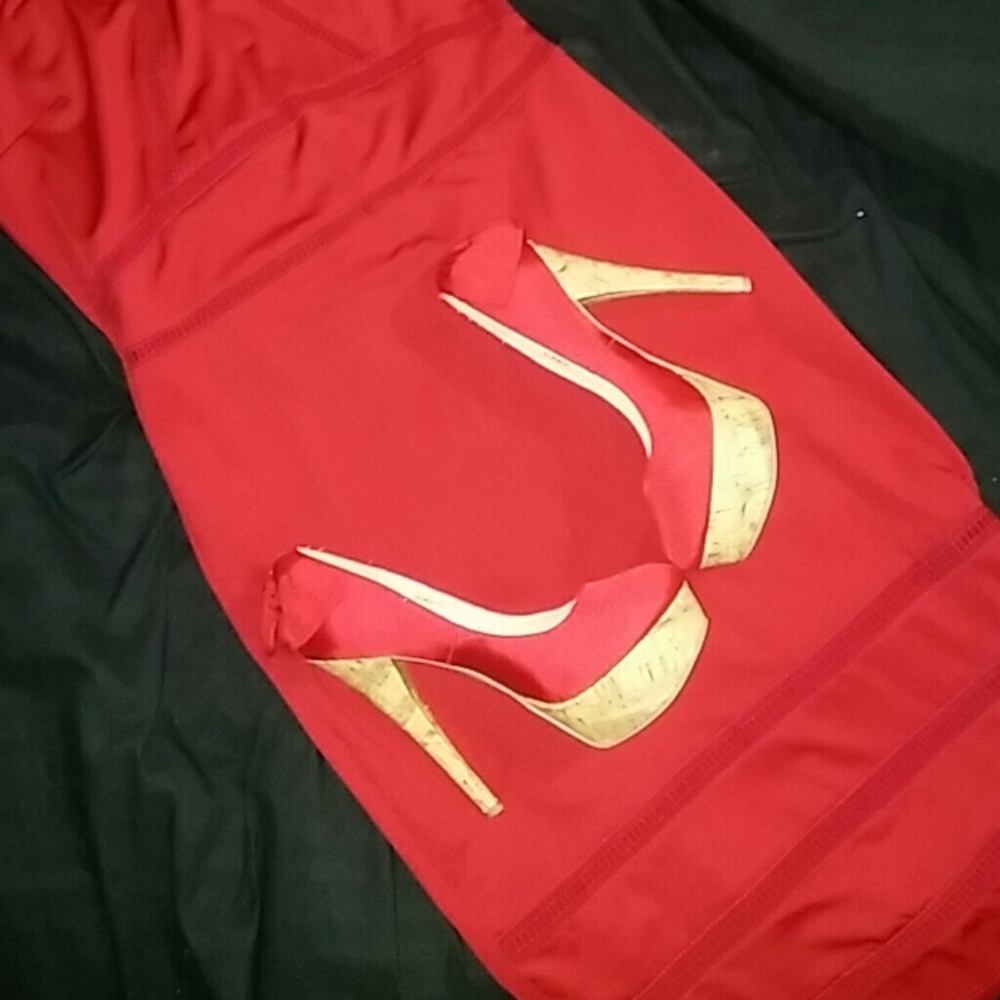 Sexy Red heels with bow on the back.