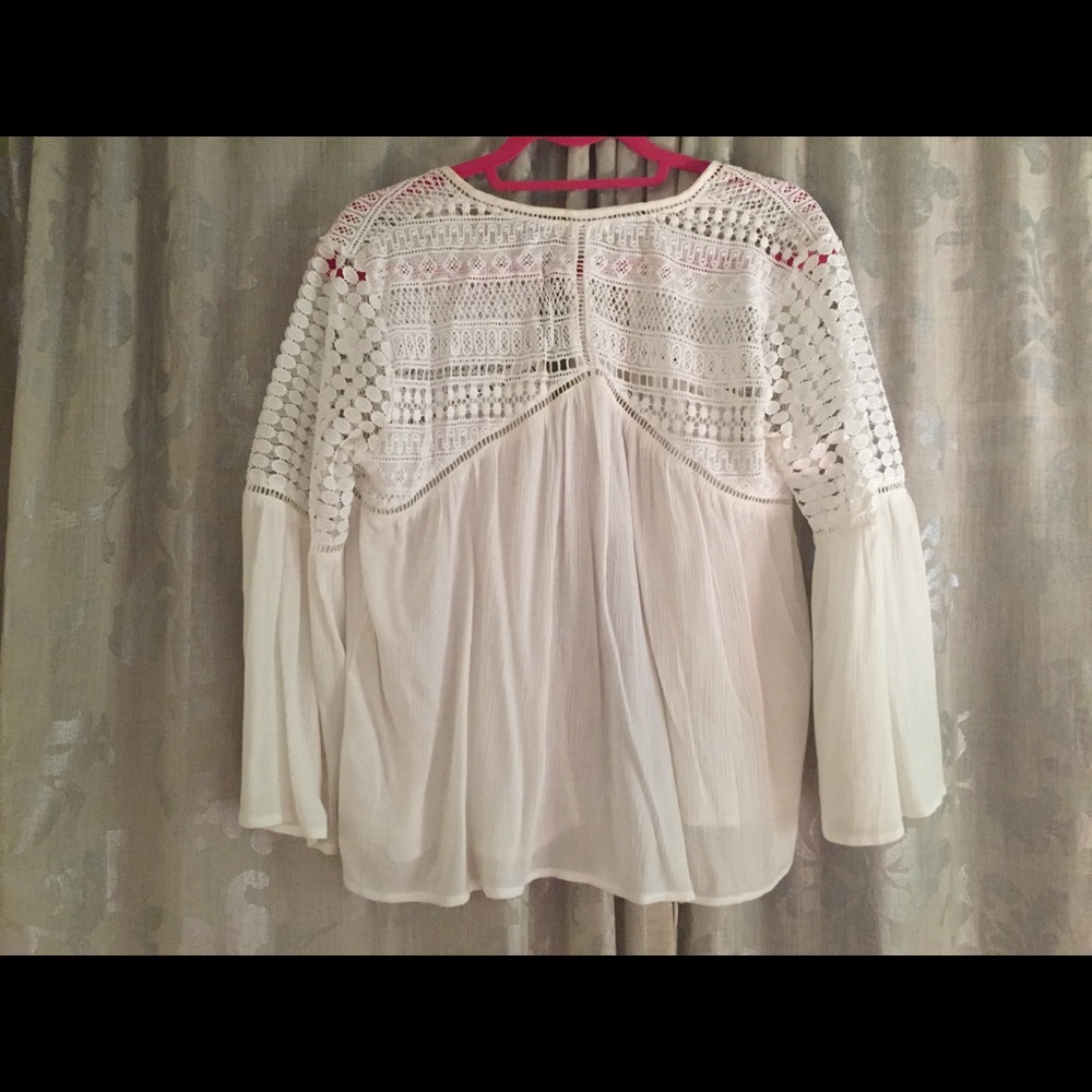 Front lace, open back, bell sleeve blouse