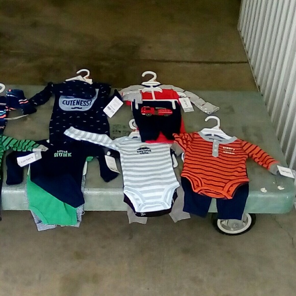 Newborn baby clothes with tags