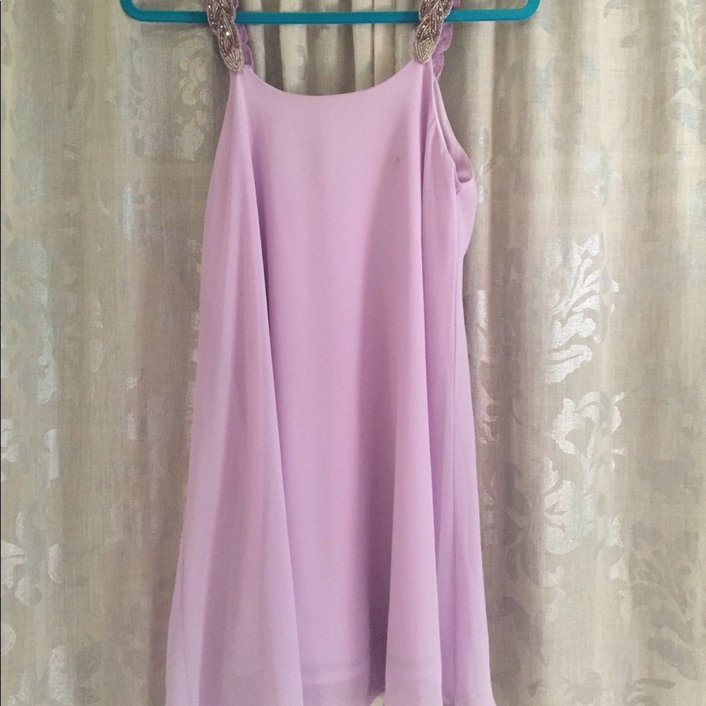 Dusty purple, embellished sleeves, low vback swing