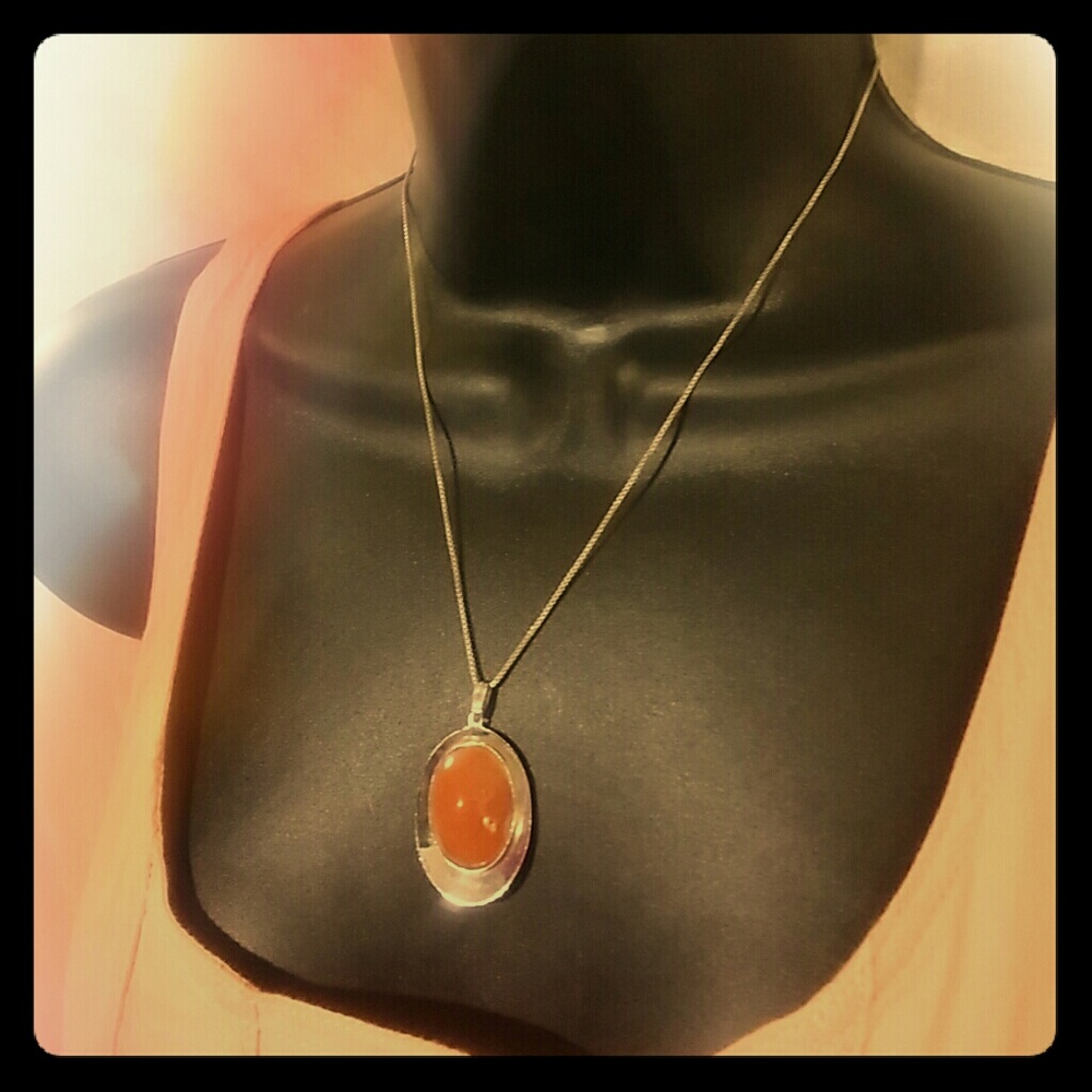 Silver necklace with silver and orange stone/gem