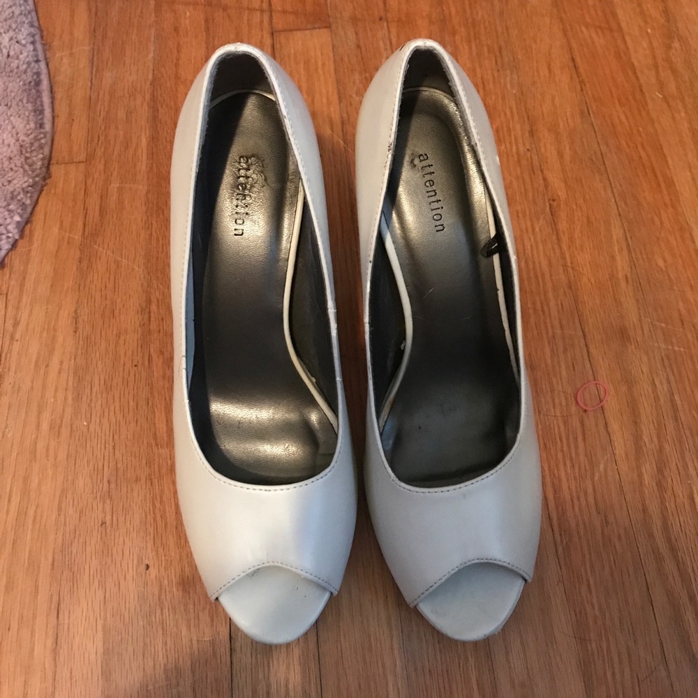 White and black heels