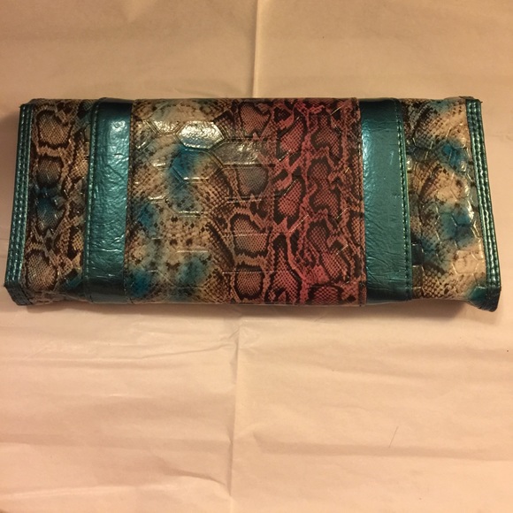 Multi color wallet from Buckle. - Picture 2 of 3
