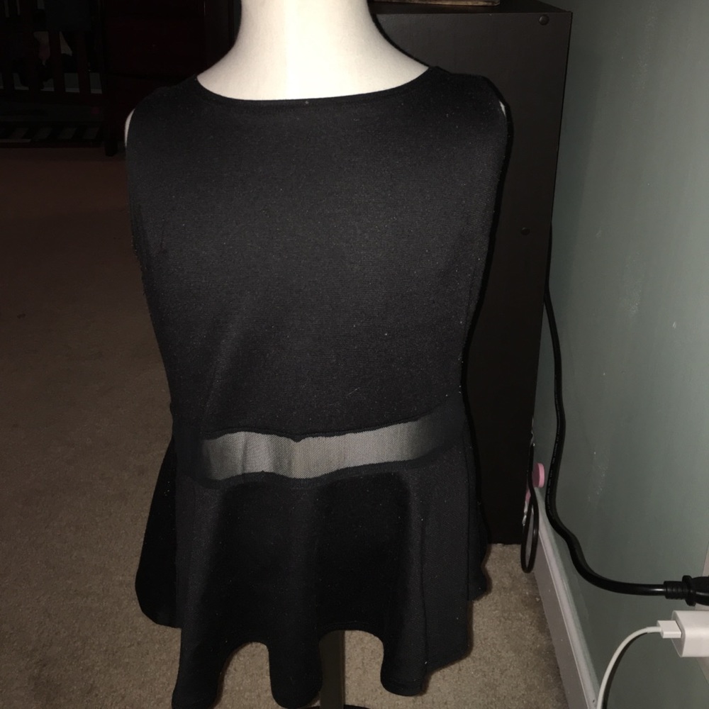 Black peplum shirt with a see through line