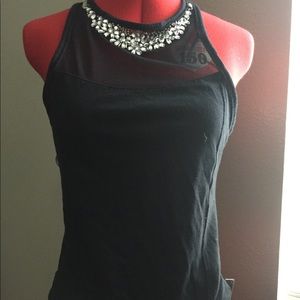 Navy blue tank top with rhinestone neck and shear