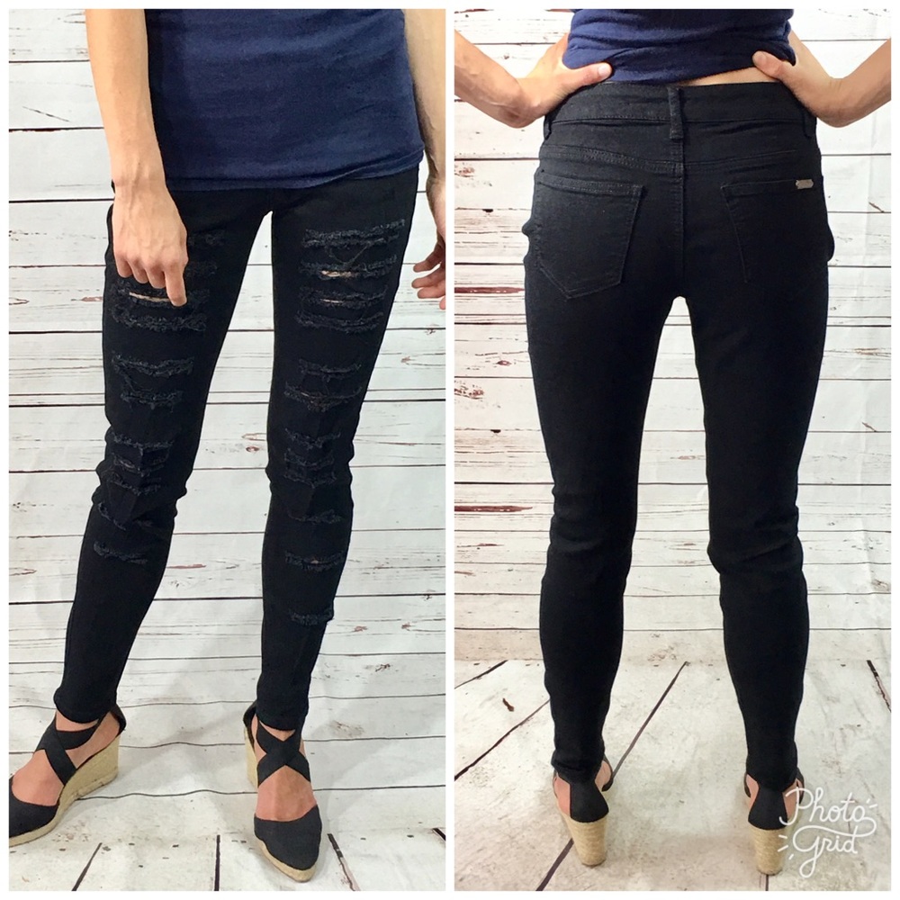 Mid Rise Ripped Skinny Jeans in Black