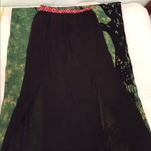 Black skirt with slits & tribal design waistband