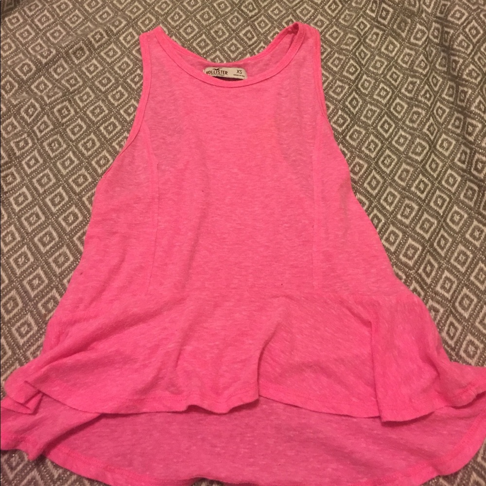 Pink tank top.