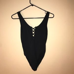 Body suit with front detail