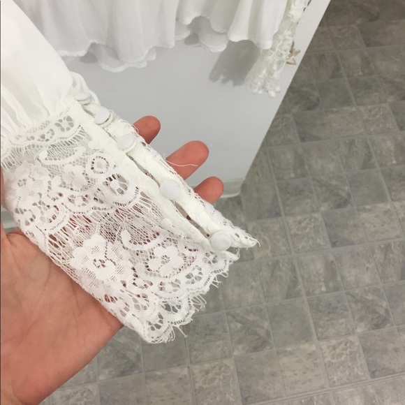 Flowing white blouse with lace detailing - Picture 2 of 3