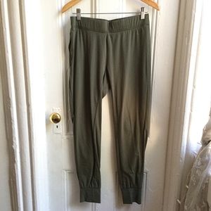 Army green track bottoms Nike
