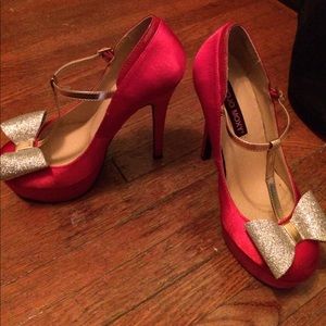 Red sparkly high heels