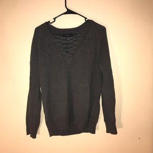 Green sweater with lace up front