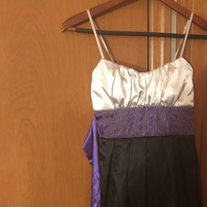 White and black dress with a purple belt