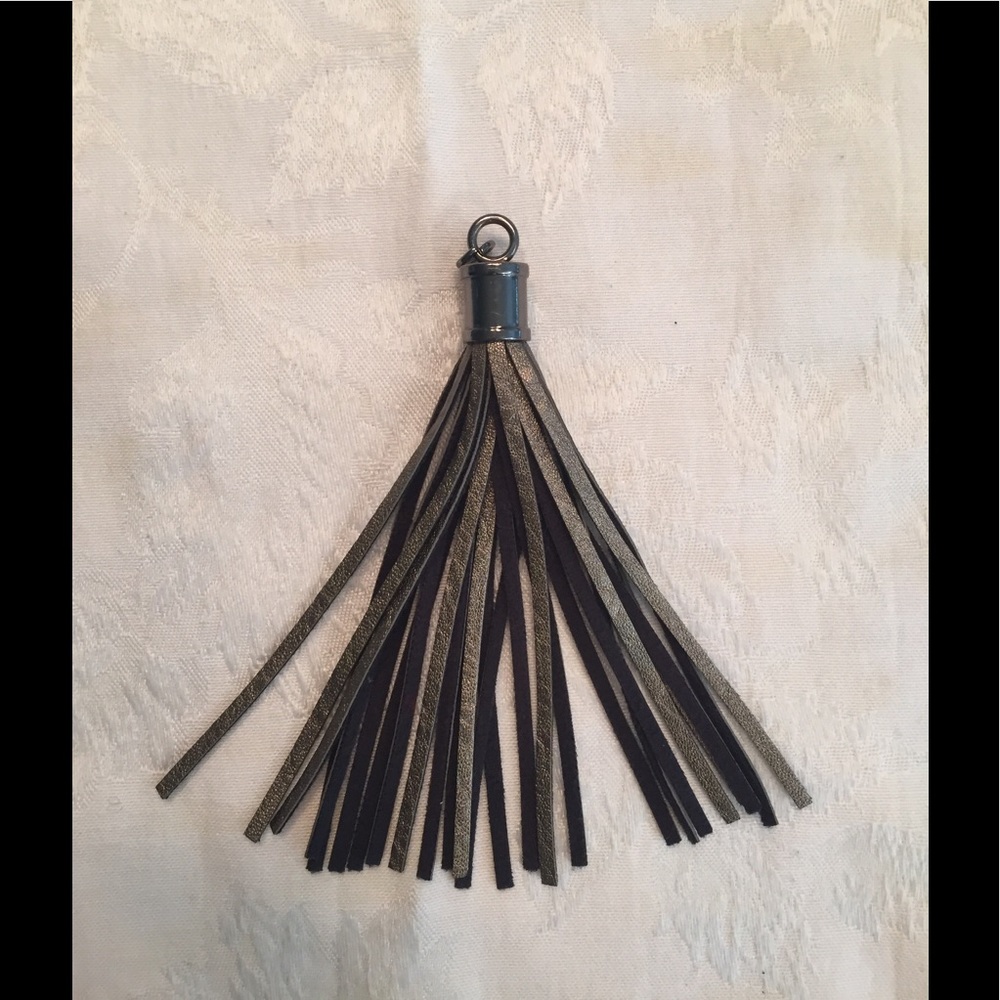 Silver gray keychain tassel.