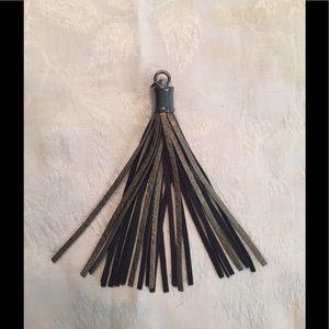 Silver gray keychain tassel.