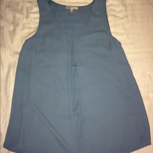 Blue sleeveless blouse