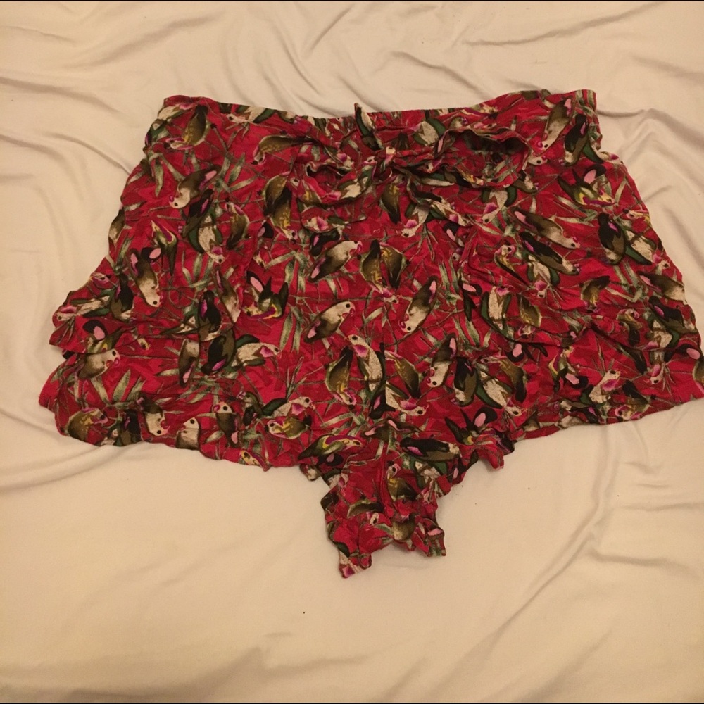 Red shorts with front flaps and tie