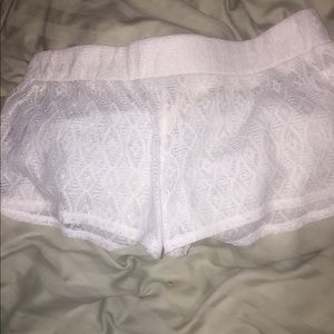 White swim cover shorts