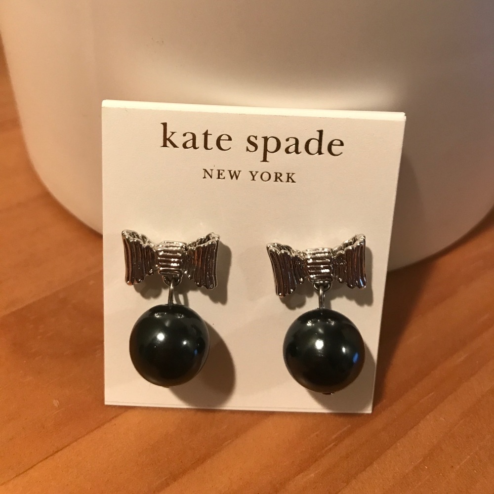 Kate Spade earring and Juicy Couture bracelet