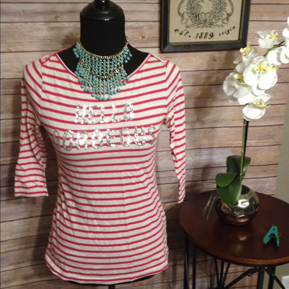 Pink/white striped boat neck tee shirt. 3/4 sleeve