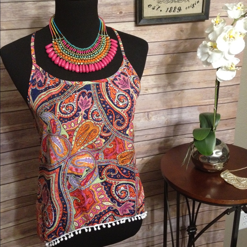 Silky high/neck camisole with split back.