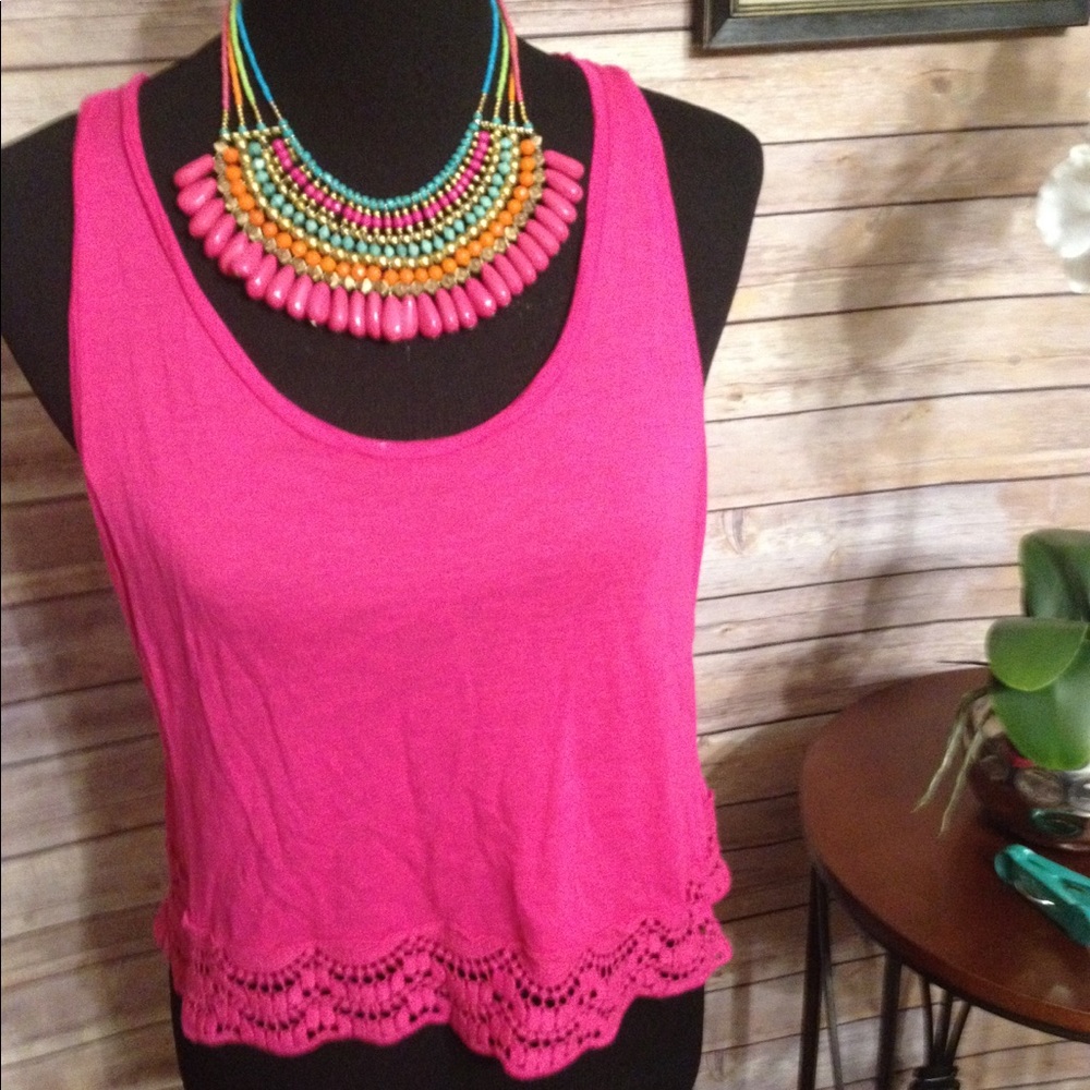 Pink crop top.