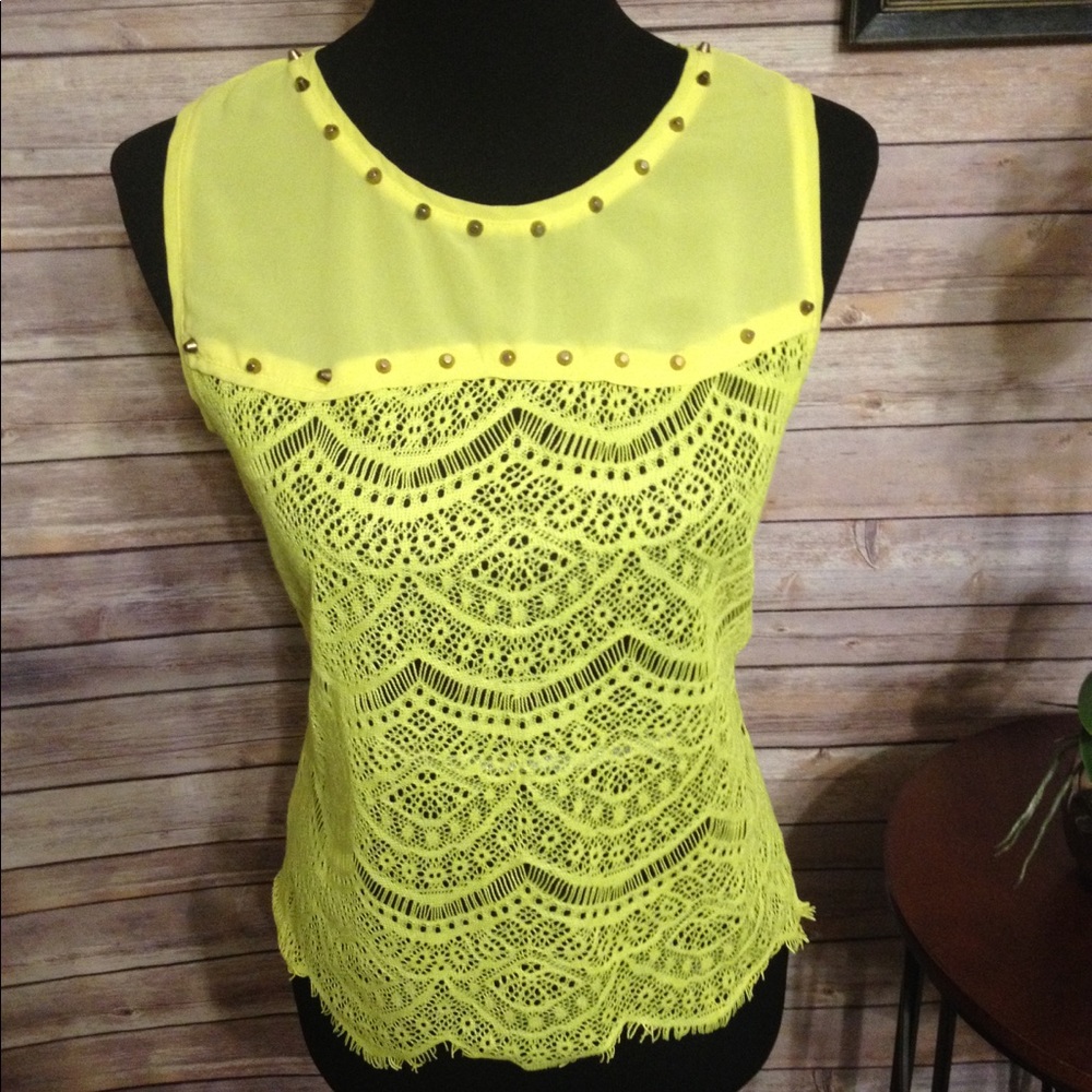 Bright yellow lace blouse.