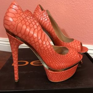 Bebe peach/coral peep toe heels.