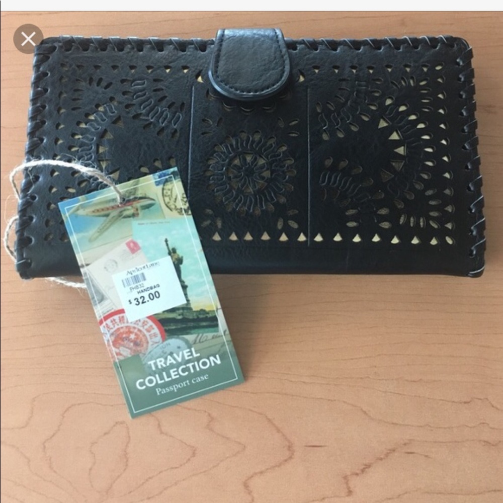ISO Madison West wallet!