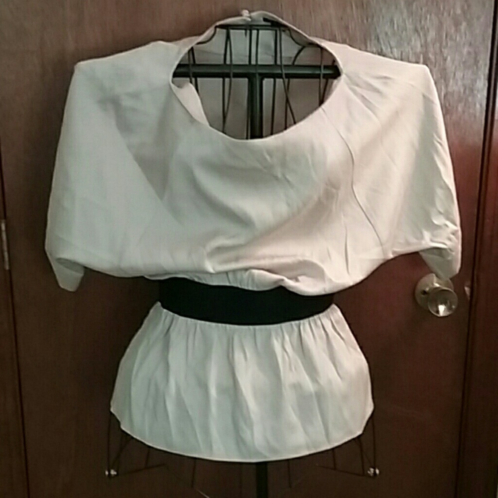 Stunning tan blouse with elastic waist.