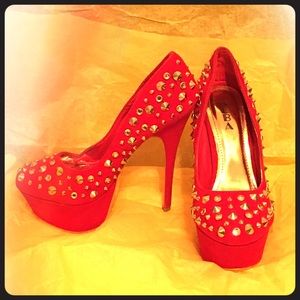 Red suede pump w/ Gold Spikes 👠